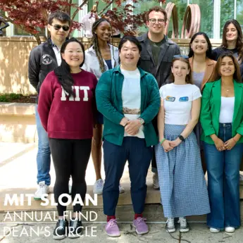 Group of students standing outside of MIT Sloan building E62; MIT Sloan Annual Fund Dean's Circle logo overlaid.