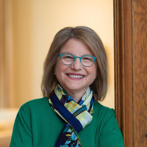 A woman poses for a photo