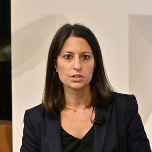 Woman speaks to audience