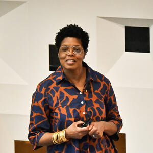 Woman speaks to audience