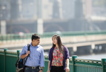 Students walking on bridge