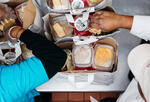 Community Servings workers preparing and packing food