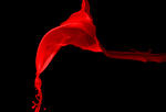 Red splash of paint resembling a flag