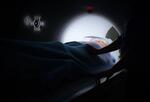 Person entering CT scan machine