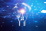 clear lightbulb exploding against a blue background