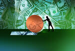 a woman pushes a large penny in front of a background of dollar bills