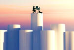 telecommuting worker at a desk atop a pillar, representing the benefits of remote work