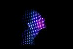 Woman's face covered in dots of light against a black background.