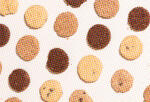 a sheet of various flavors of cookies