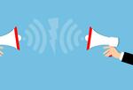 Two megaphones talking at each other but not getting through.