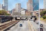 Cars going in and out of Boston via the highway.