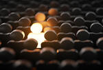a glowing figure stands out in a crowd to represent diversity hiring barriers