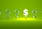 5 lightbulbs next to a lit-up dollar sign, representing venture capital funding new ideas