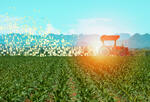 A photo illustration of a smart tractor with binary code coming out of it