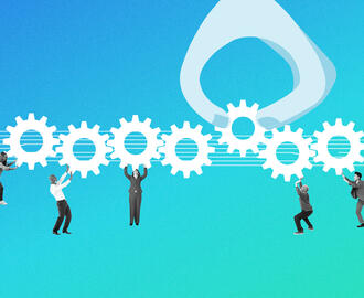 A group of workers lifts and pushes cogwheels